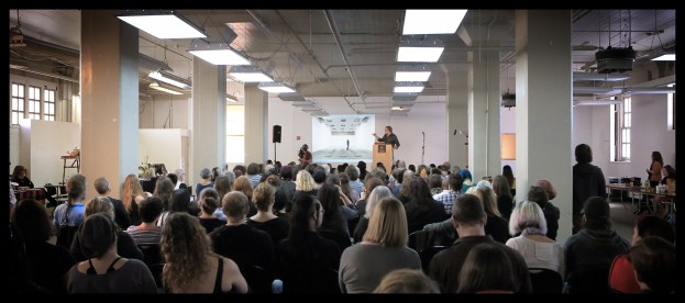 Artist David Orr speaking at Death Salon: San Francisco. Photo by Annetta Black